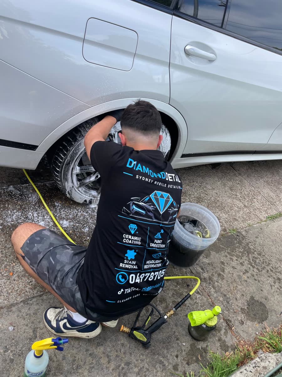 Detailer cleaning wheels